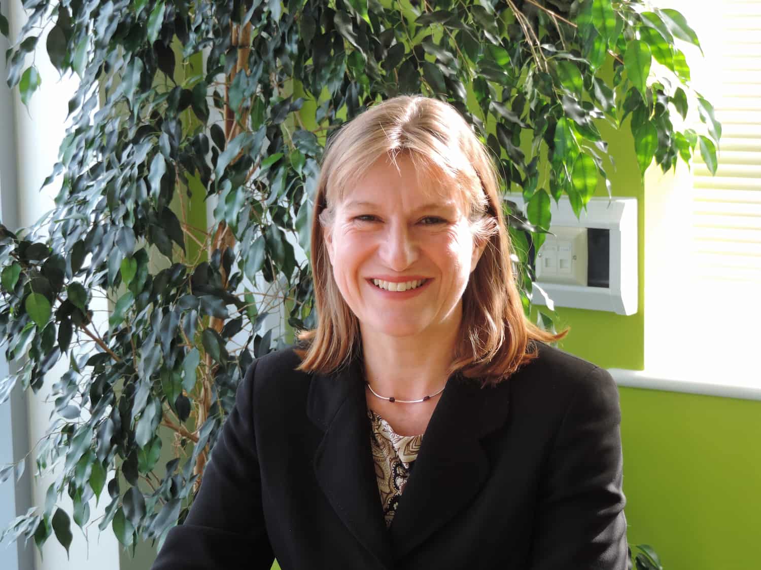 Portrait photo of Adele Madin Director