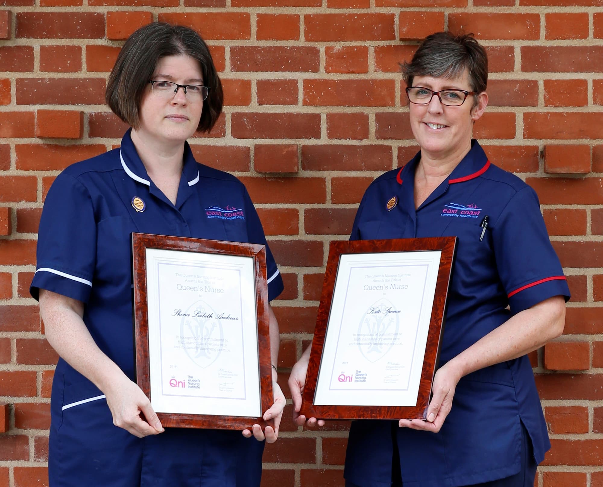 Two ECCH nurses presention their queens nurses awards