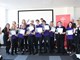 Princes Trust trainees posing for picture holding certificates