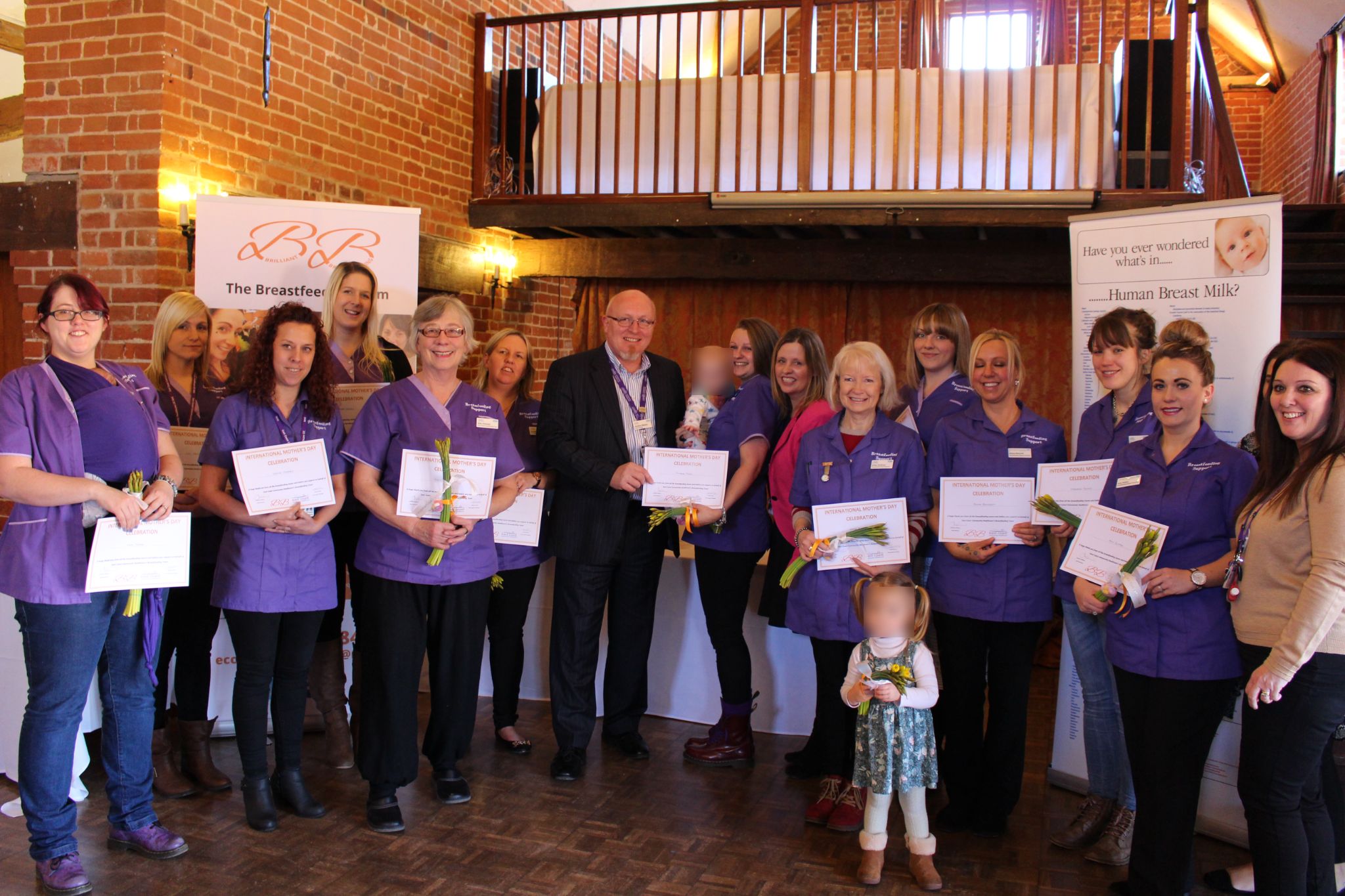 Team of breastfeeding peer supporters celebrating